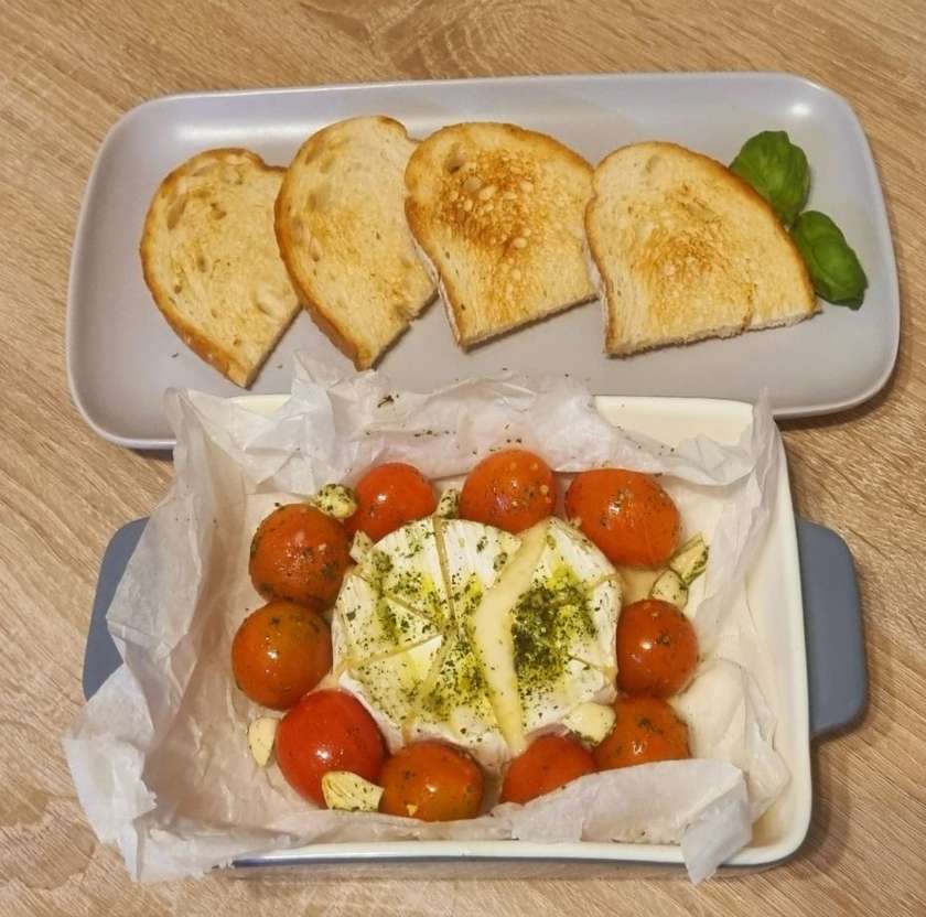 Baked Camembert with Cherry Tomatoes, Spicy Green Butter and Croutons