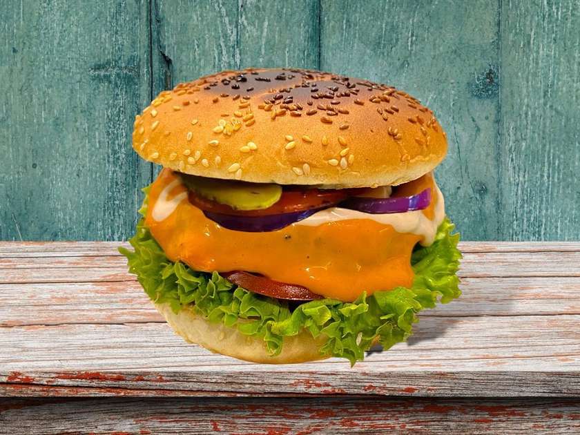 Veganio's burger with cheese sauce