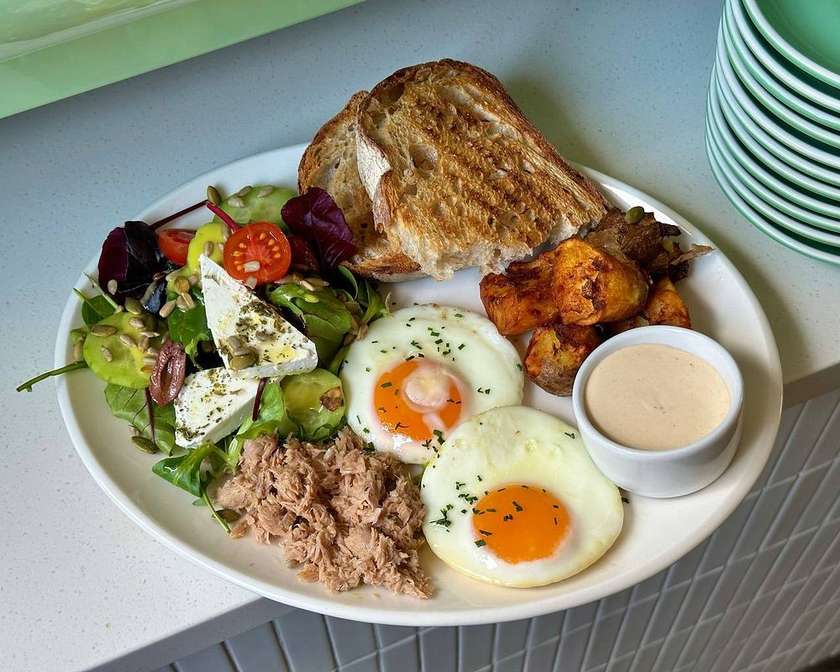 Breakfast with tuna and scrambled eggs