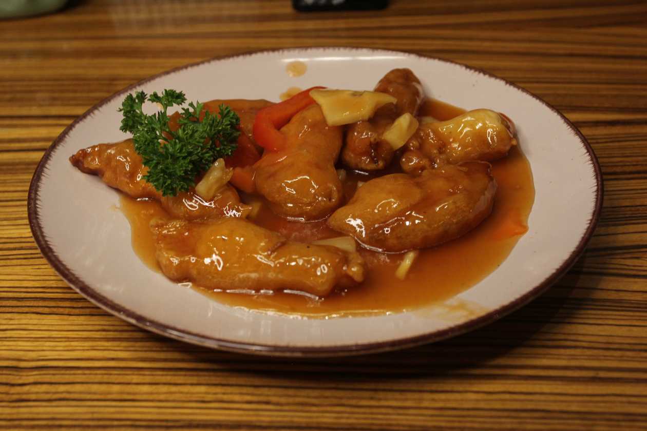 23.Chicken in sweet and sour sauce with rice