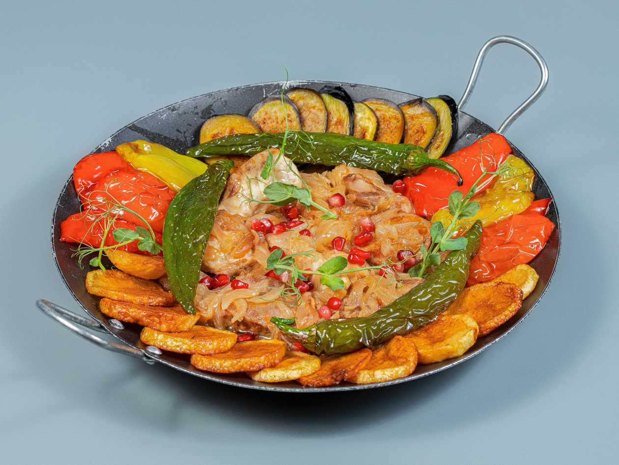Grilled Sturgeon on a Metal Plate