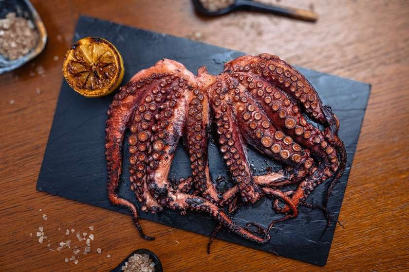 Grilled whole Senegalese octopus
