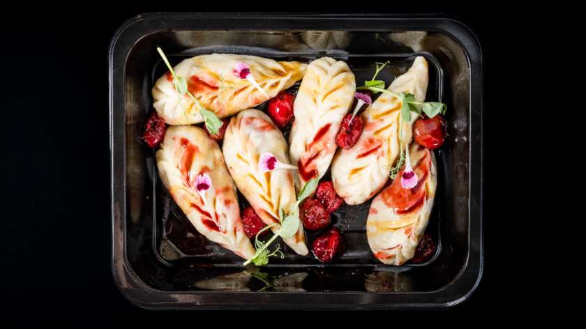 DUMPLINGS WITH PULLED DUCK AND RED CABBAGE