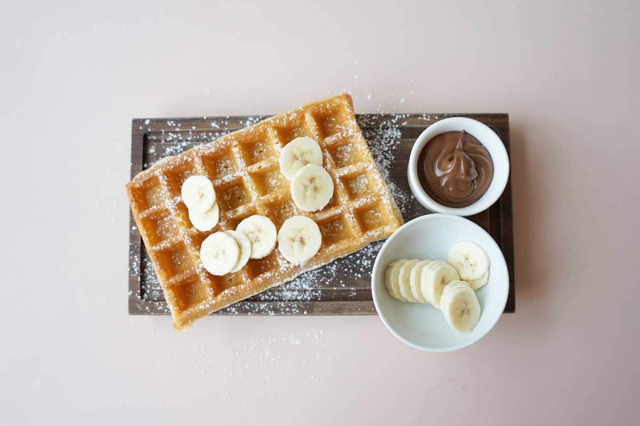 Brussels waffle with nutella and banana slices