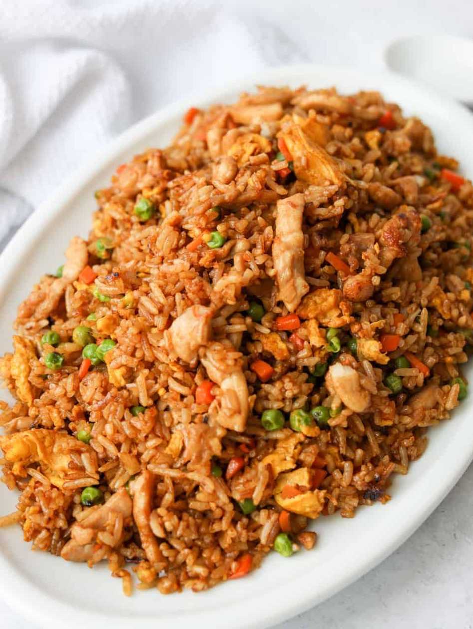Jollof(Served With Sautéed Vegetables and Beef Stew