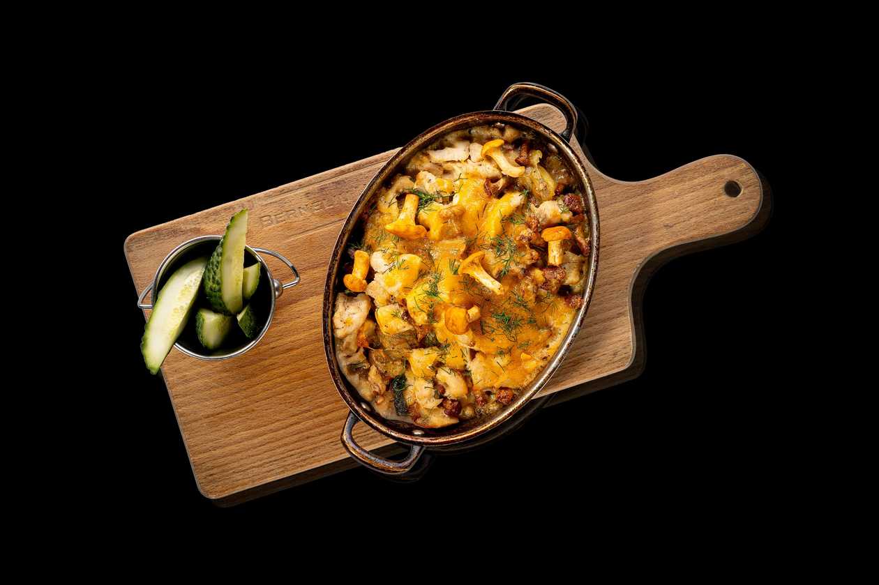 Crushed Potato with Chicken, Chanterelle Sauce and Cheddar Cheese Crust
