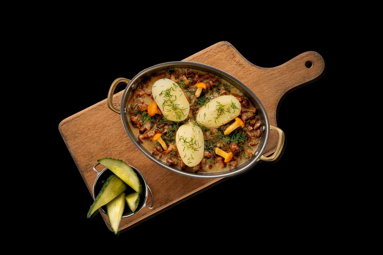 Fresh Chanterelles with New Potatoes in a Pan