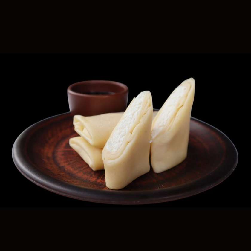 Cheese-filled Crepes with Lingonberry Sauce