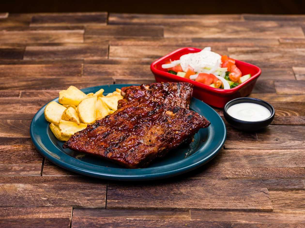 BBQ pork ribs medium. Large serving in the photo