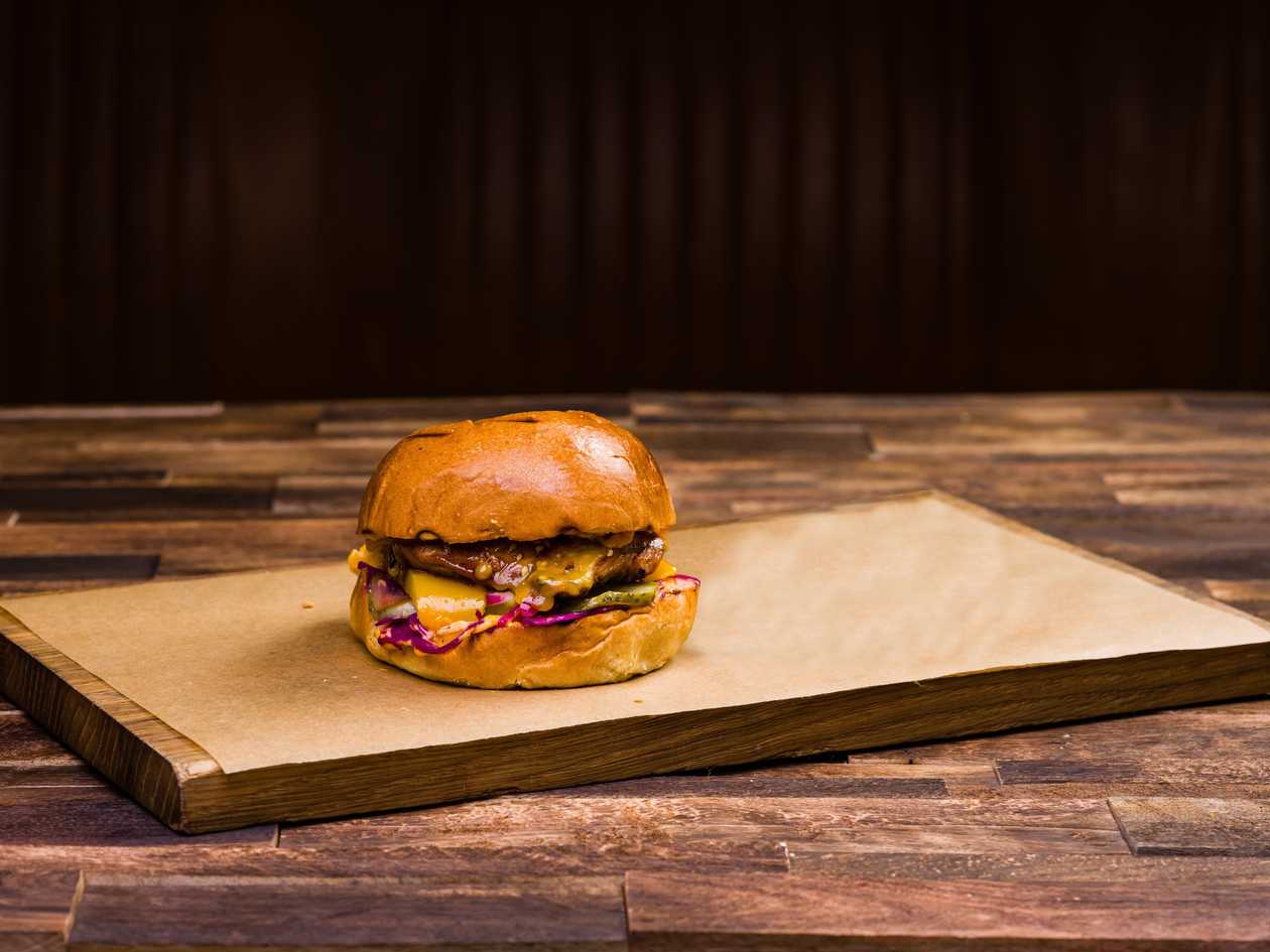 Teriyaki chicken thighs and pickled vegetables burger