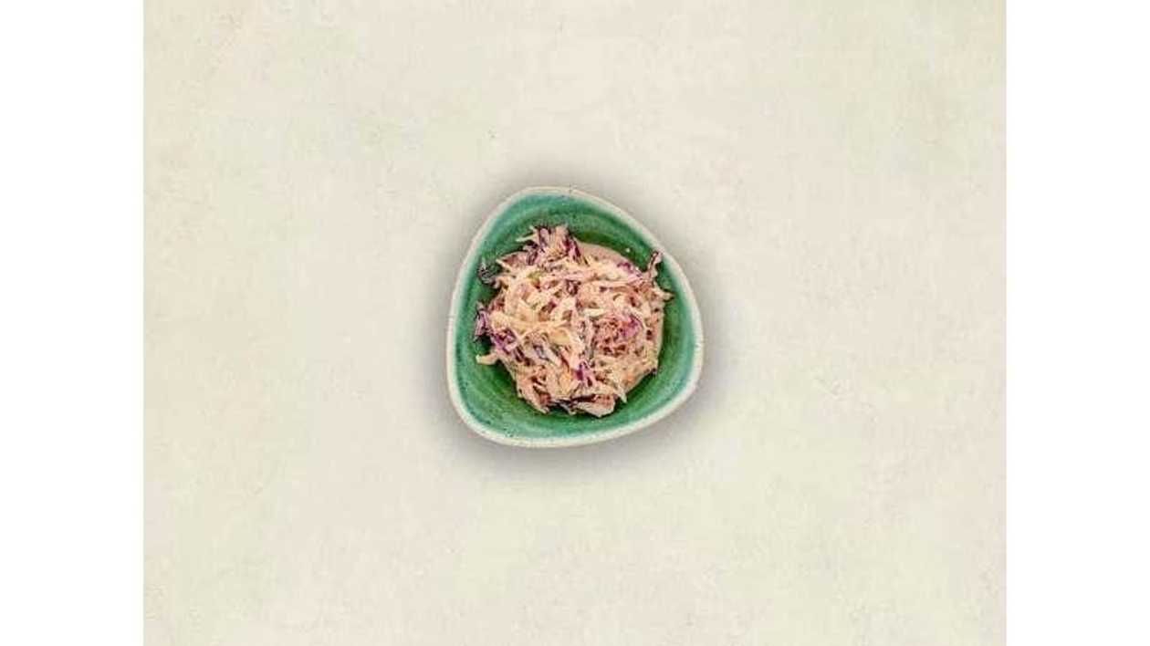 Coleslaw with White Cabbage, Red Cabbage, Carrot, Red Onion, Apple Vinegar and Calypso Sauce (Mustard, Eggs)