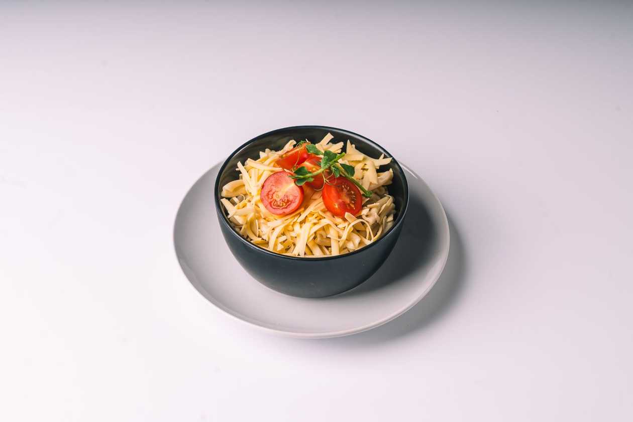 Pasta with Vegan Cheese and Cherry Tomatoes