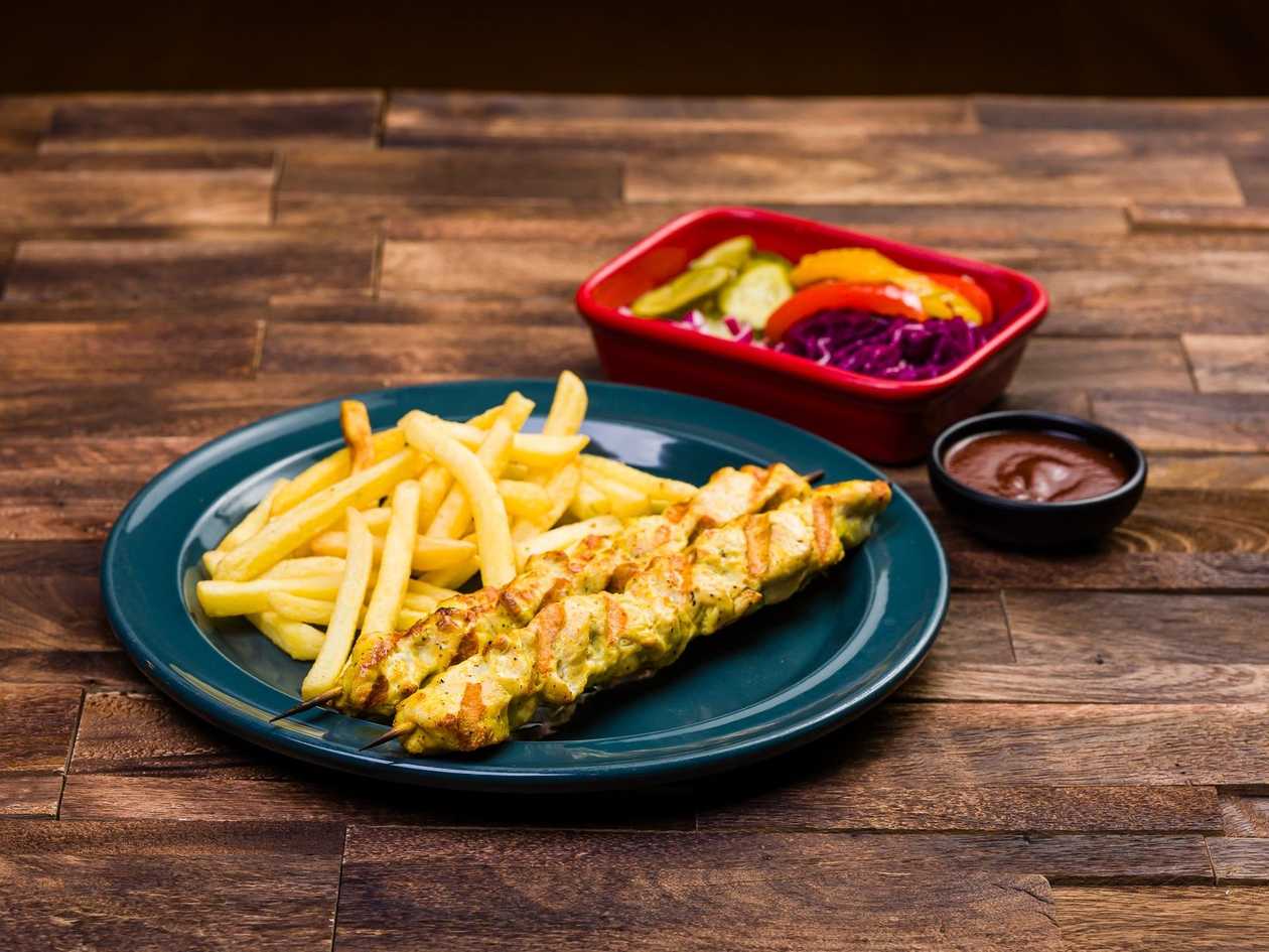 Curried chicken skewer medium. Large serving in the photo