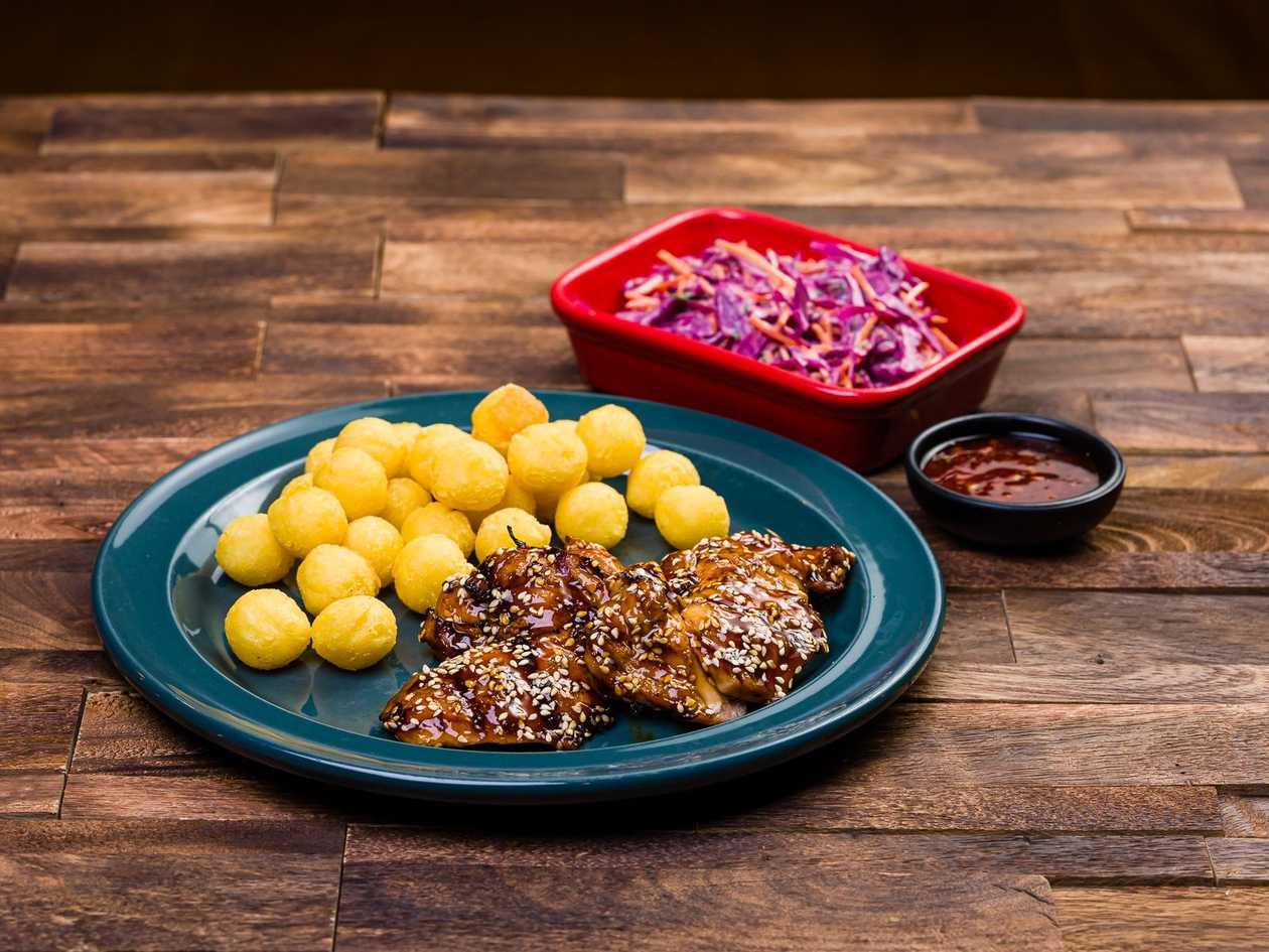 Teriyaki chicken thighs medium. Large serving in the photo