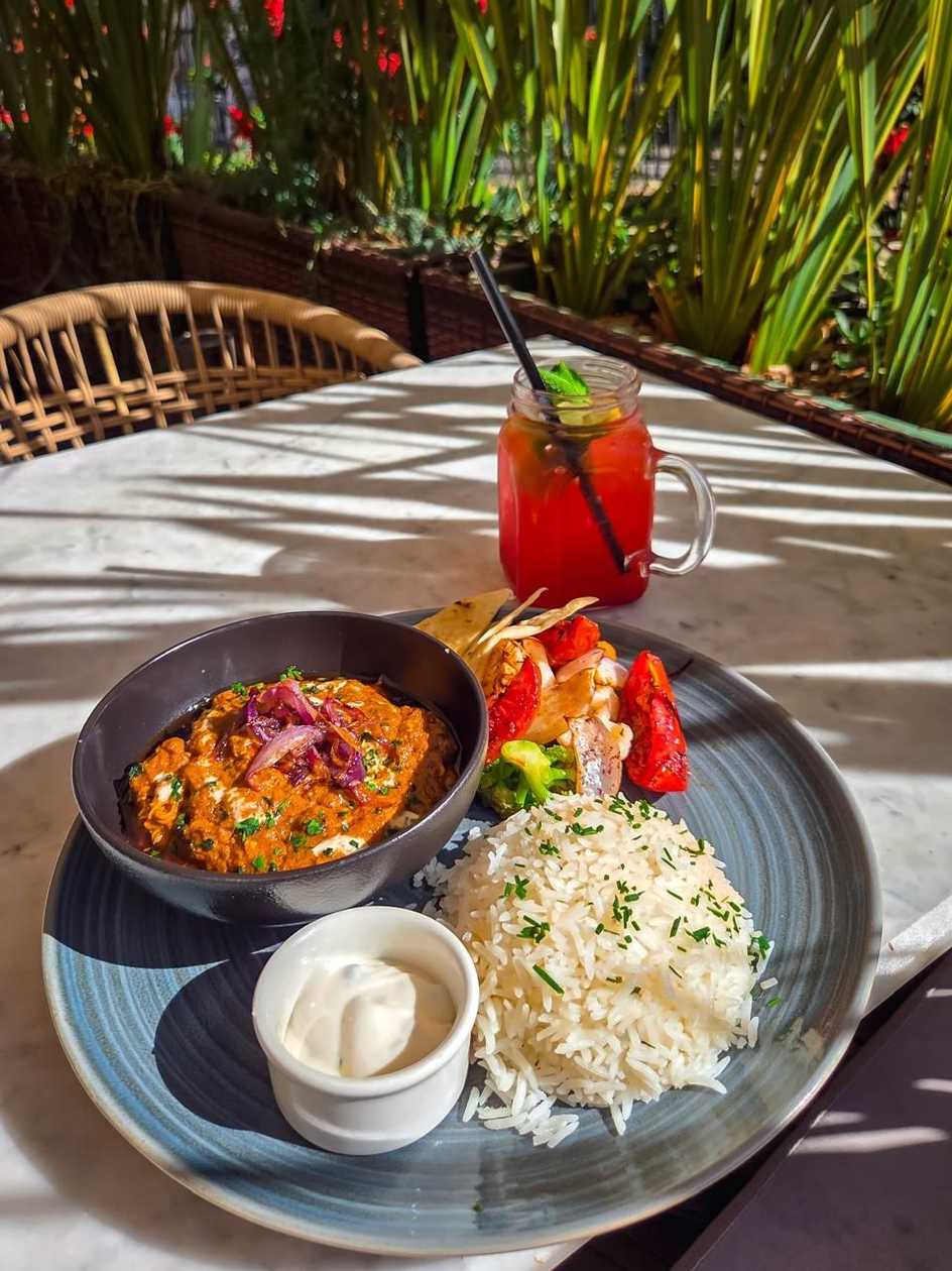 Butter chicken with naan or rice