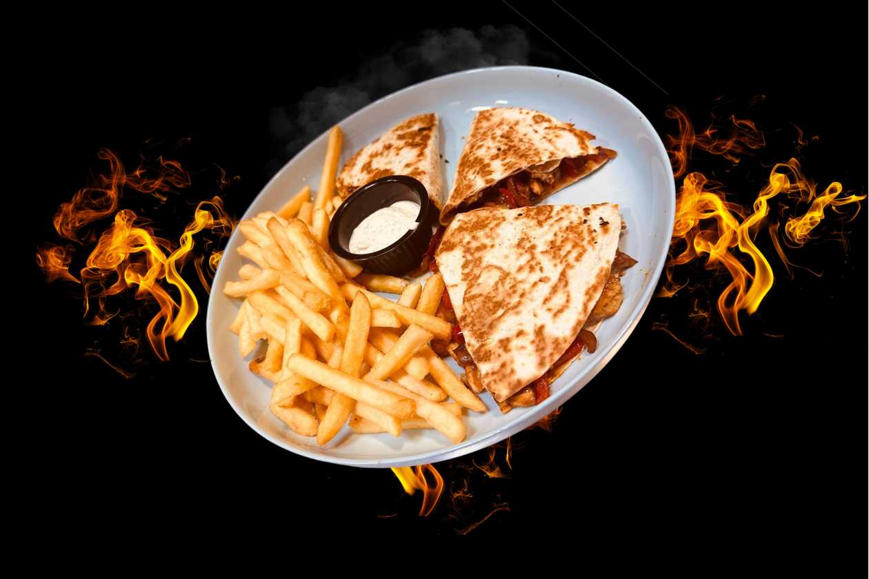 Chicken Quesadilla  (Grilled chicken breast with mixed sautéed vegetables)