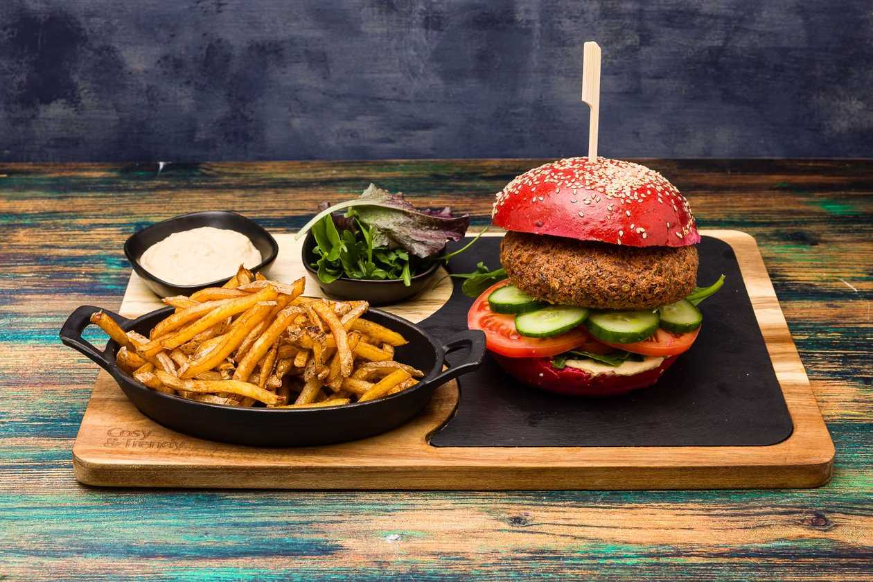 Vegetarian burger with French fries
