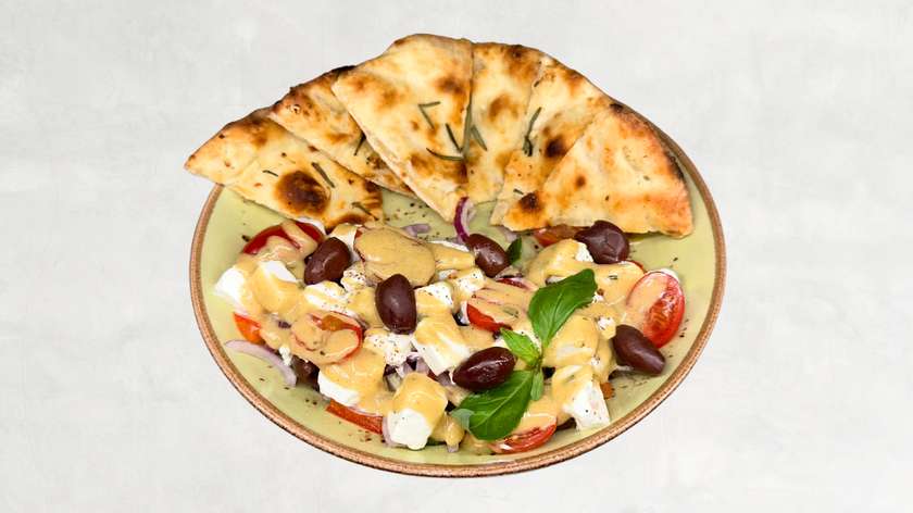 Greek salad served with focaccia