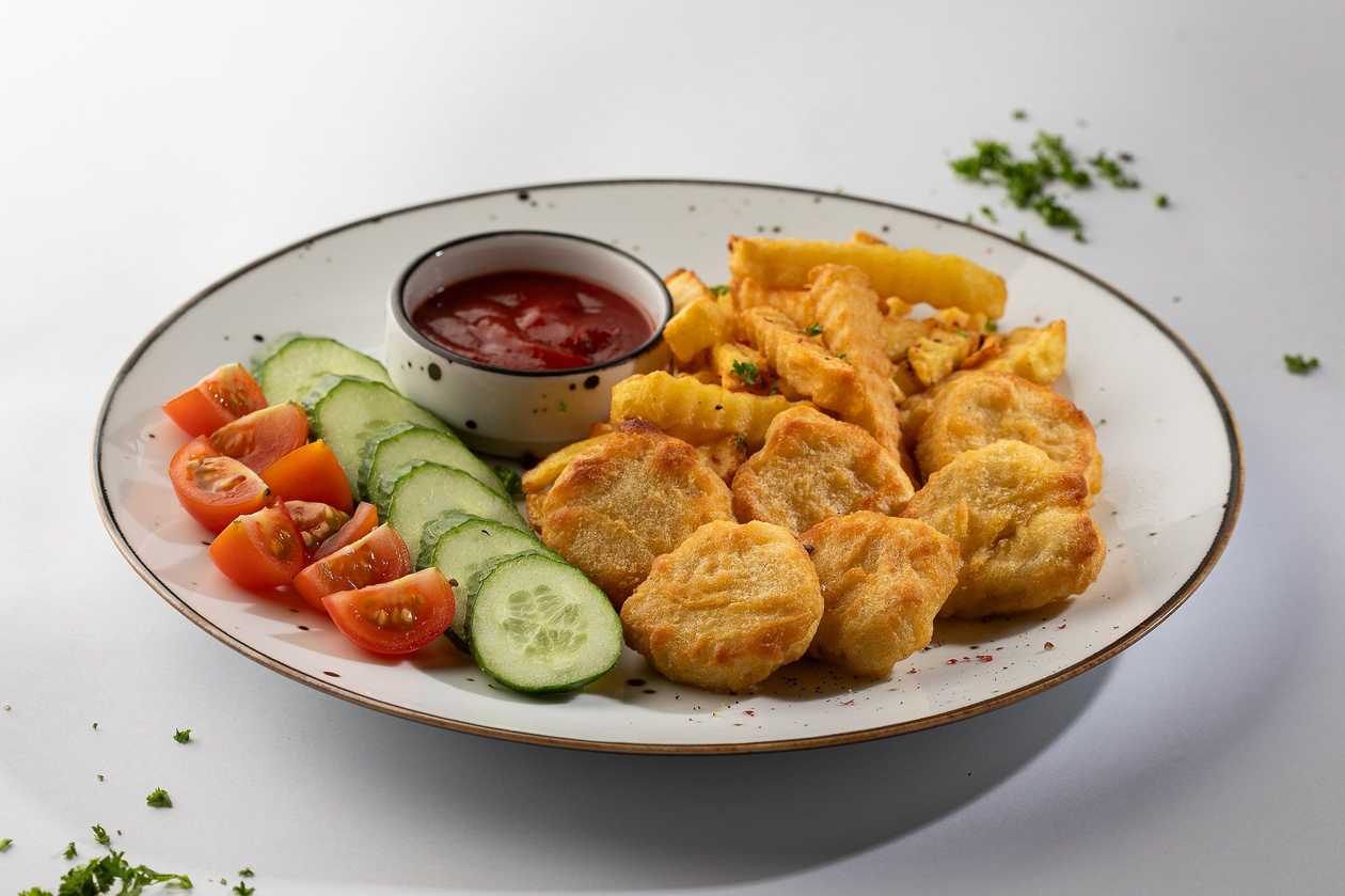 Chicken Nuggets, Fried Potatoes, Fresh Vegetables