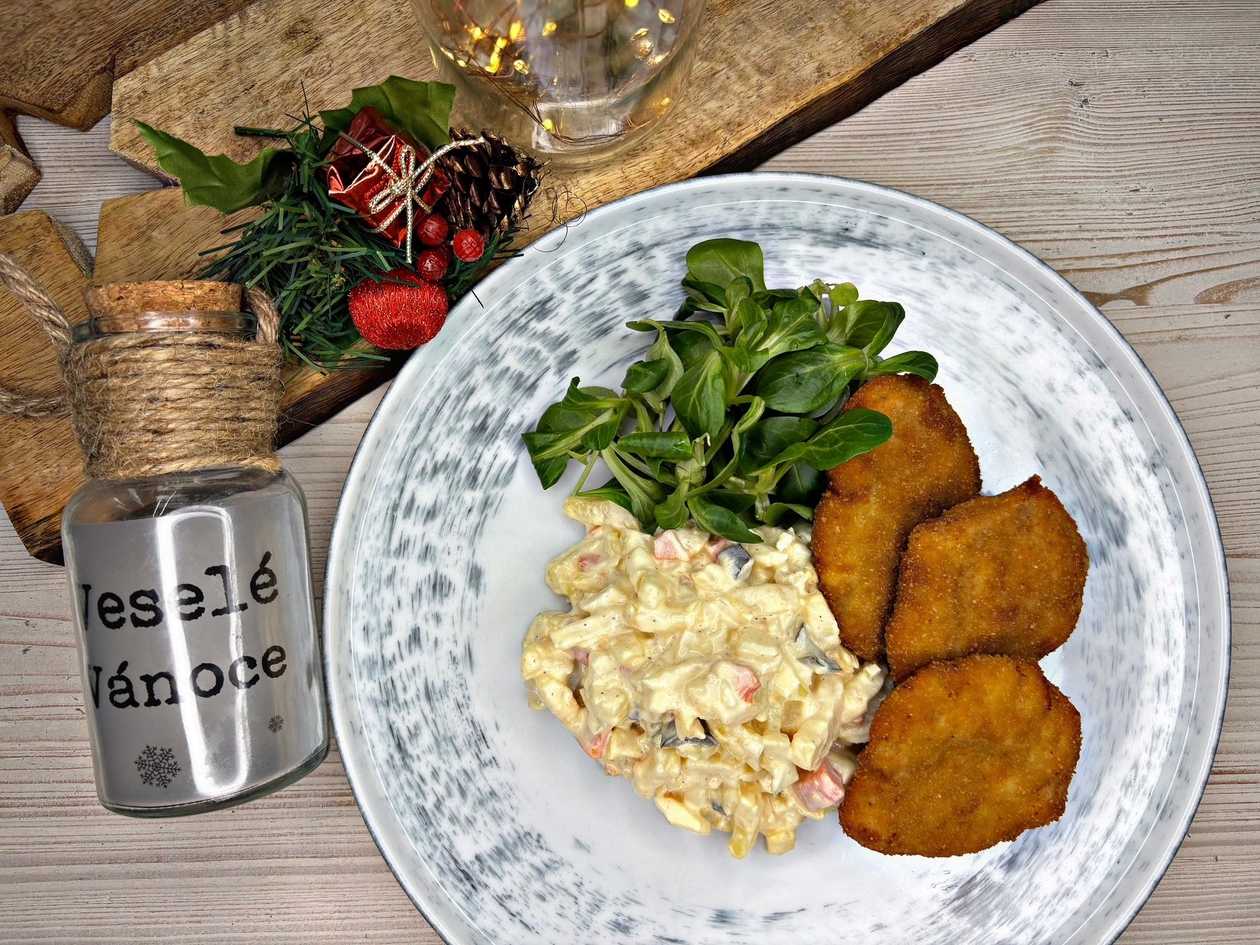 Fried Pork Schnitzel (tenderloin), potato salad, lemon, lamb's lettuce, pumpkin oil