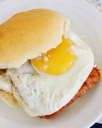 butter Toasted 2 Breadrolls or 1 large roll filled with 2 fried eggs