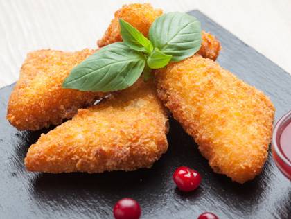 Breaded fried cheese with ham,