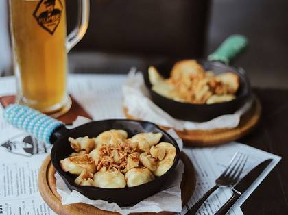 Fried pyrohy with dry Carpathian  mushrooms and potatoes