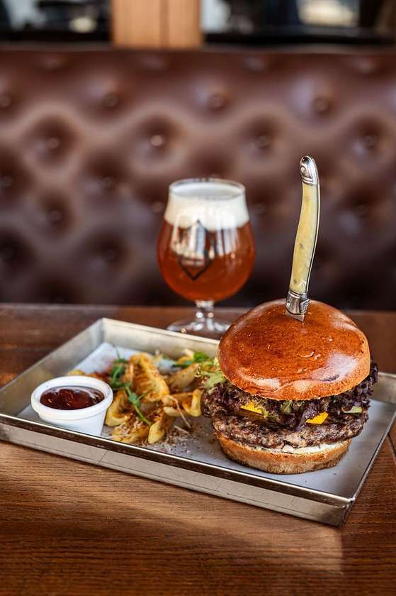 Burger with camembert and mango-mustard sauce
