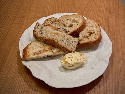 Plate of Freshly Baked Bread with Signature Butter