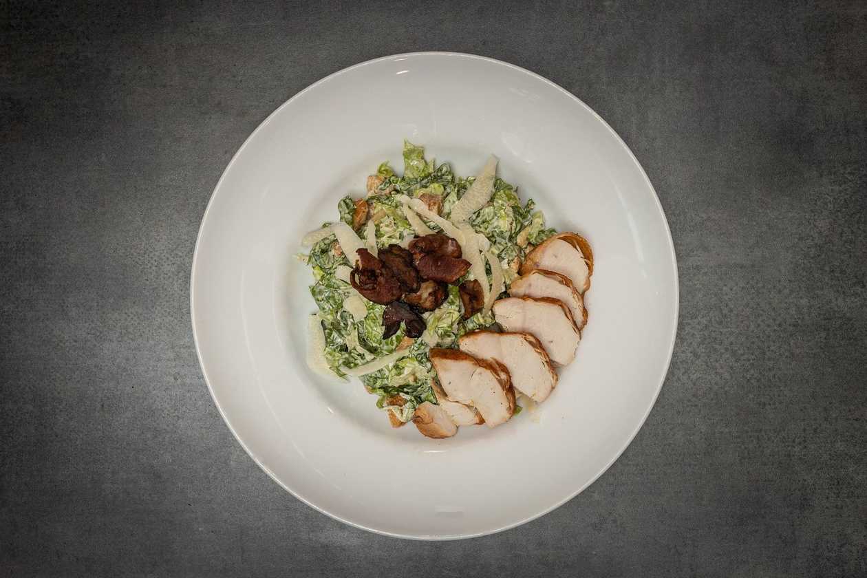 Caesar Salad with Sliced Butter Chicken Breast