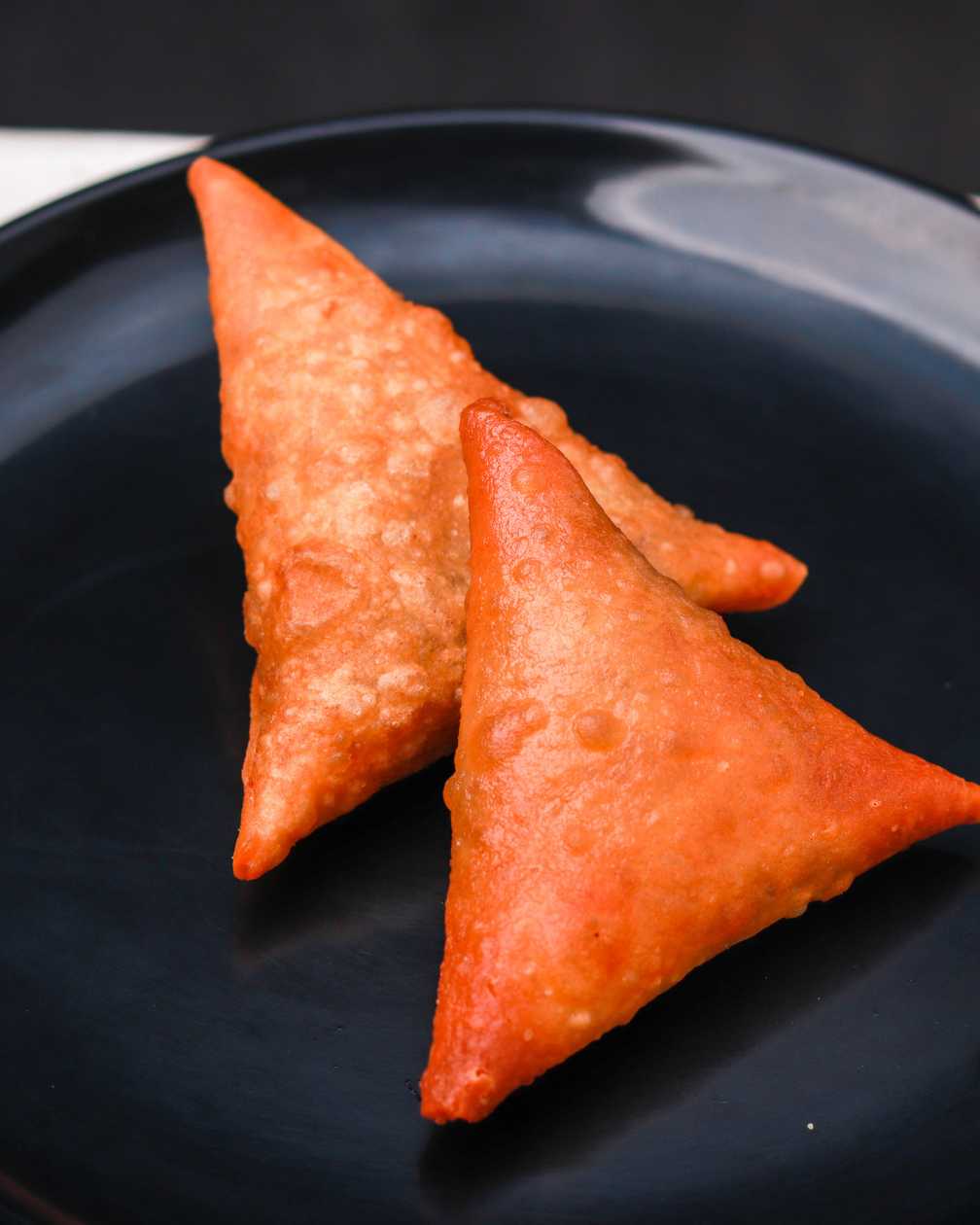 Pair of beef samosas