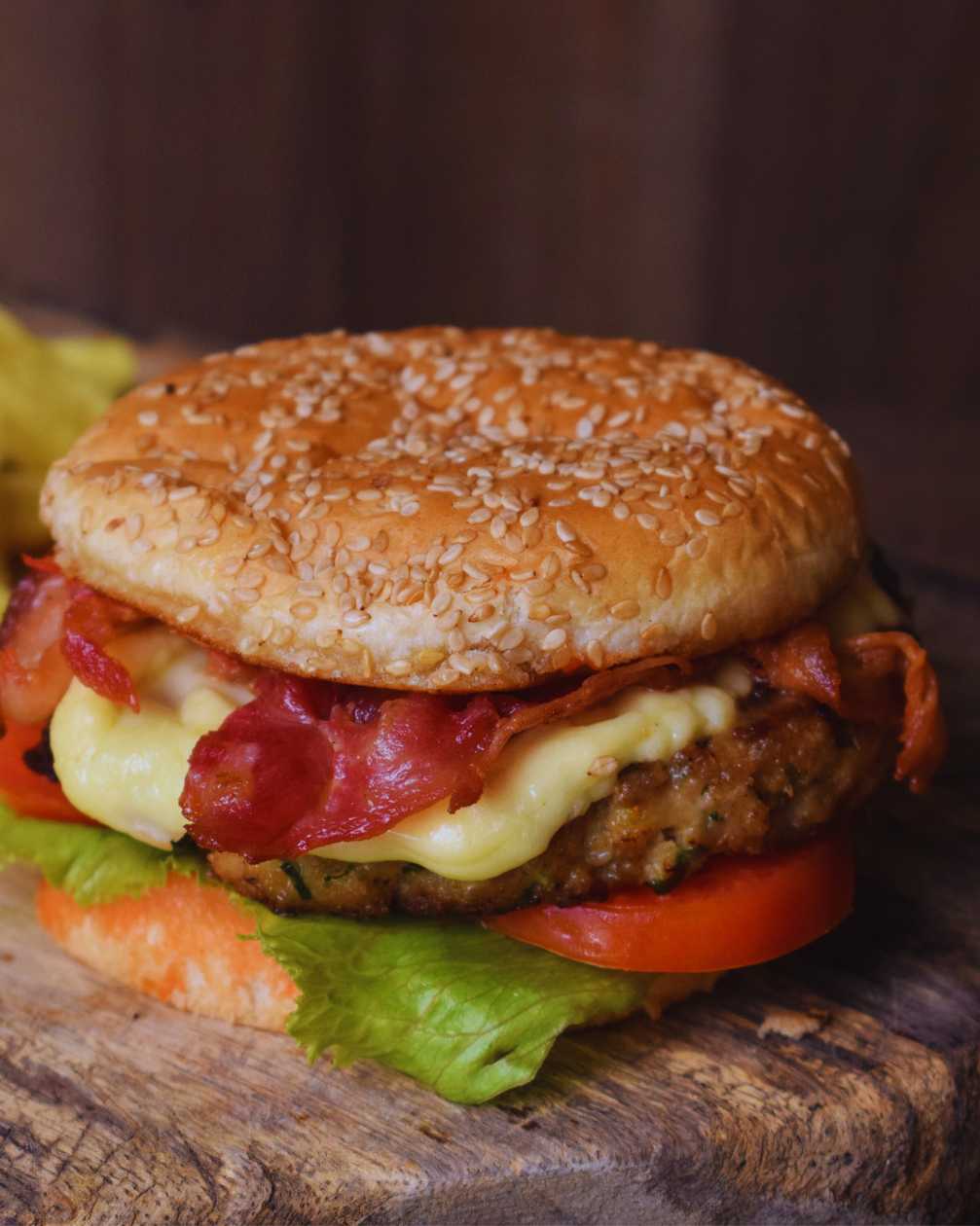 Chicken bacon and cheese burger with fries