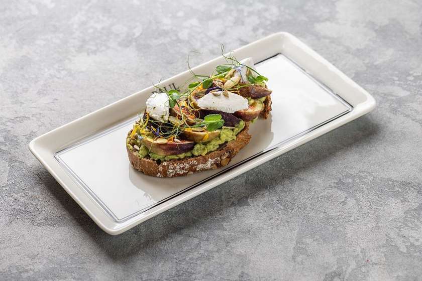 Avocado toast with figs and goat cheese