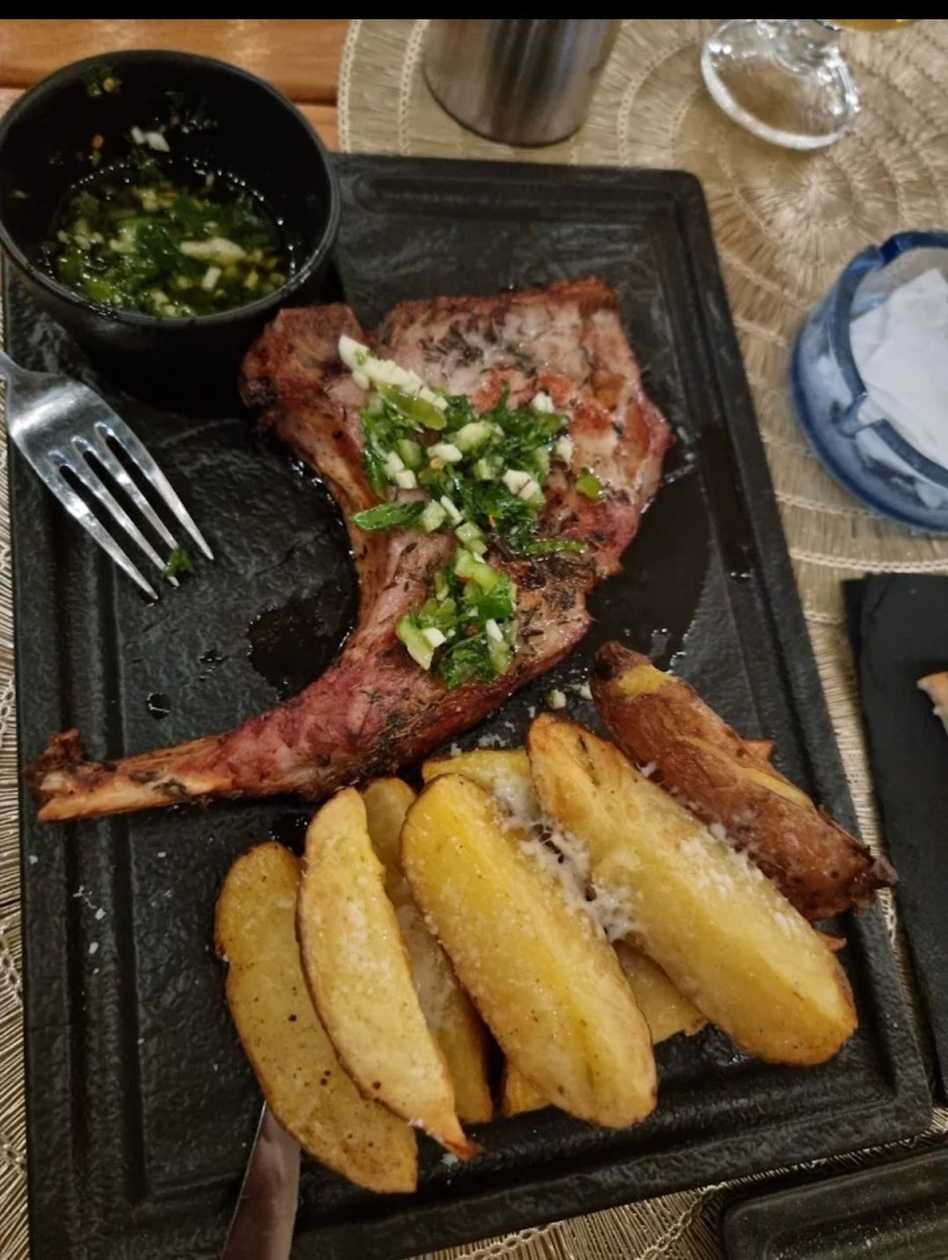 Pork Tomahawk with Baked Potatoes