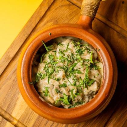 Dumplings in creamy sauce