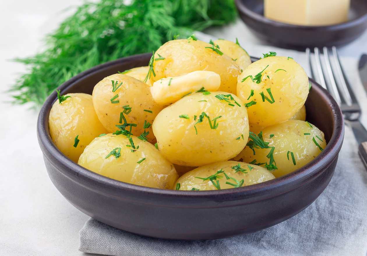 Boiled potatoes in butter