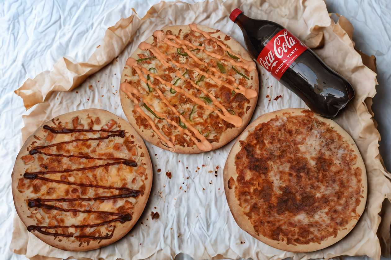 Buy 2 Pizzas Get 1 Margherita Pizza & 1.5 Litter Soft Drink FREE