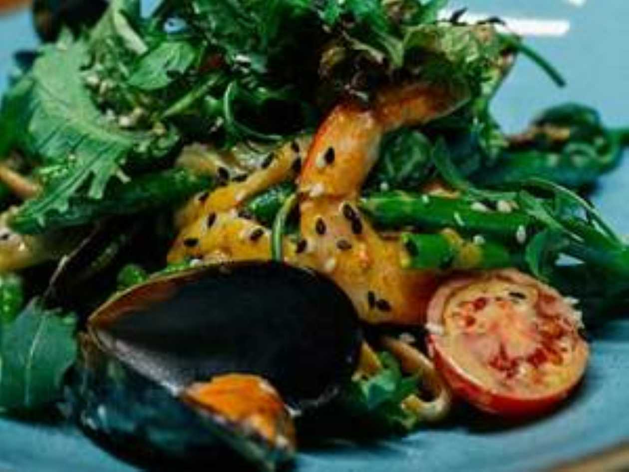 Warm seafood salad with curry sauce