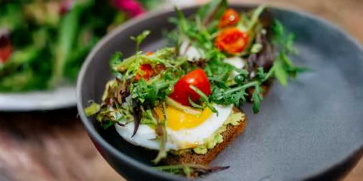 Toast with Guacamole, Fried Egg, and Greens