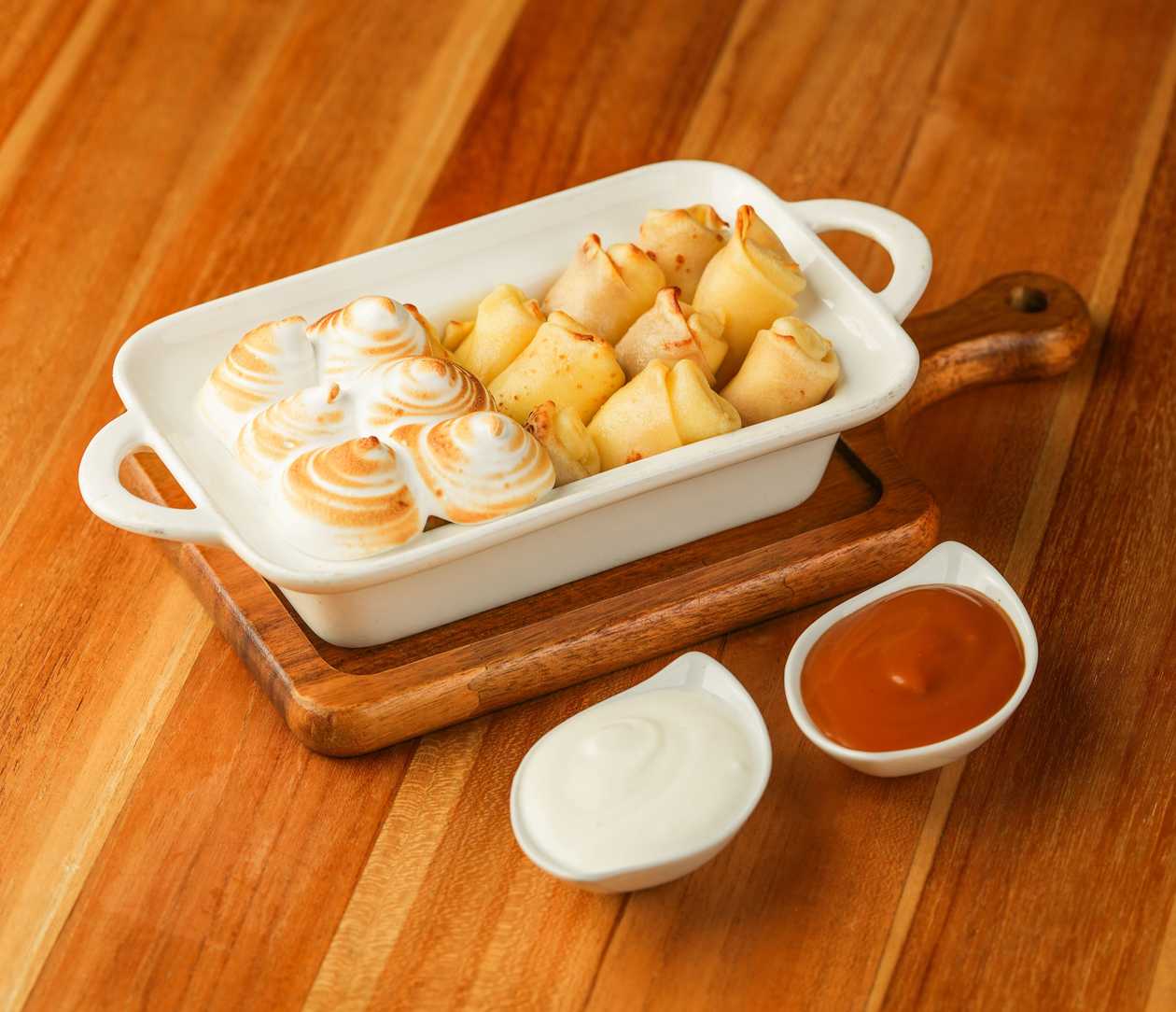 Pancakes with curd cheese and homemade caramel 240/60 g. (1,7)