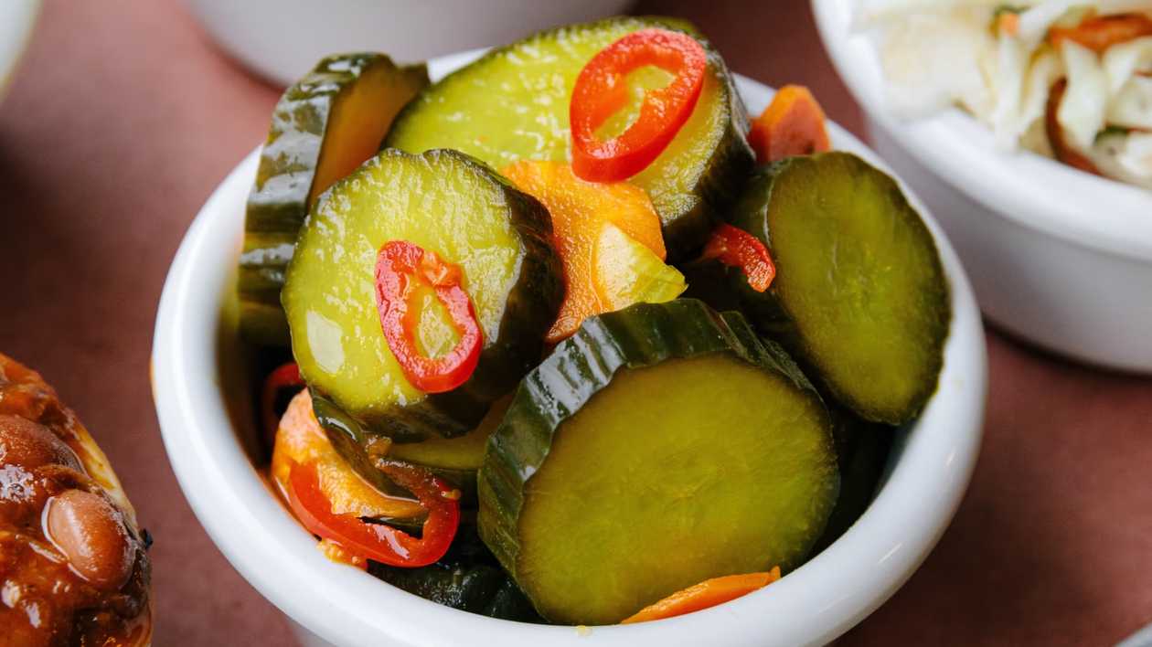 Bowl of Pickled Sweet and Spicy Cucumbers