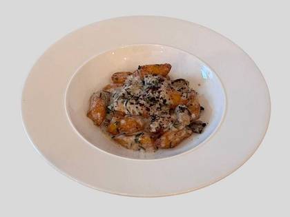 Lazy dumplings with porcini mushrooms in a creamy mustard sauce