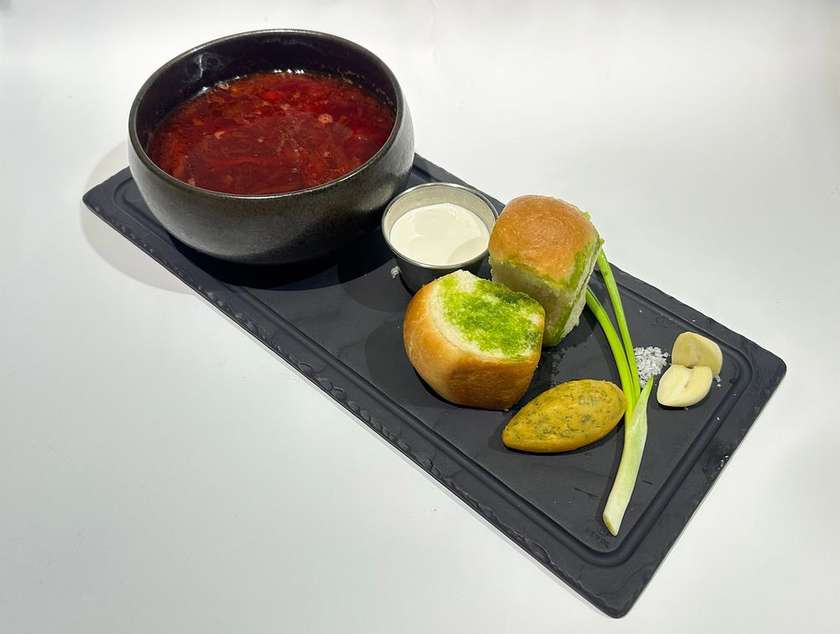 Ukrainian borscht with dried fruits and smoked beef