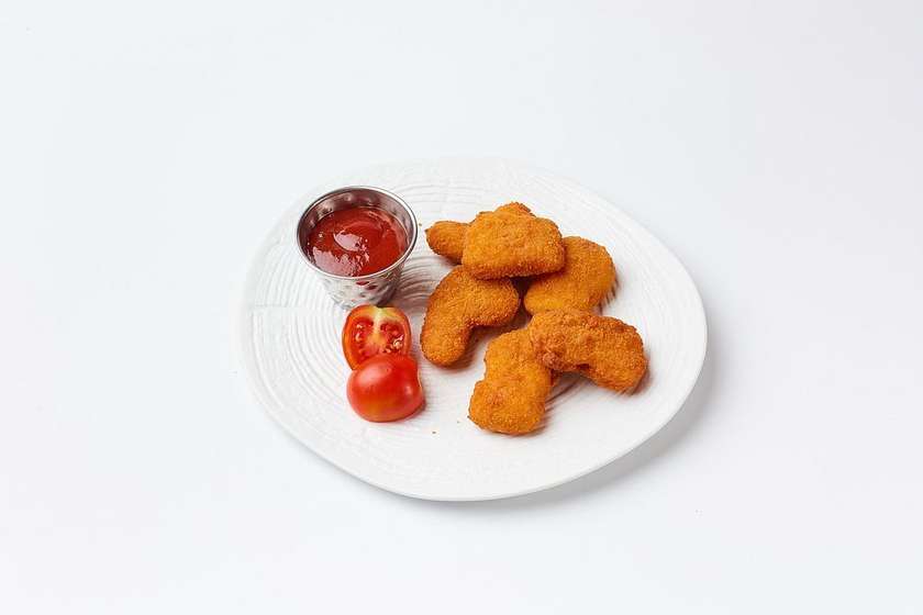 Chicken nuggets with ketchup