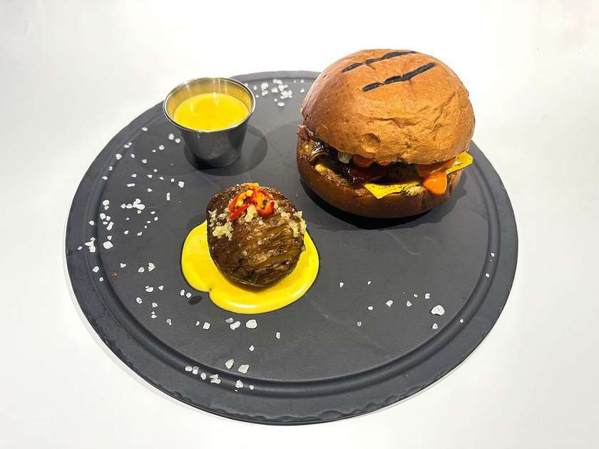 Burger with pulled beef and sweet caramelized bacon