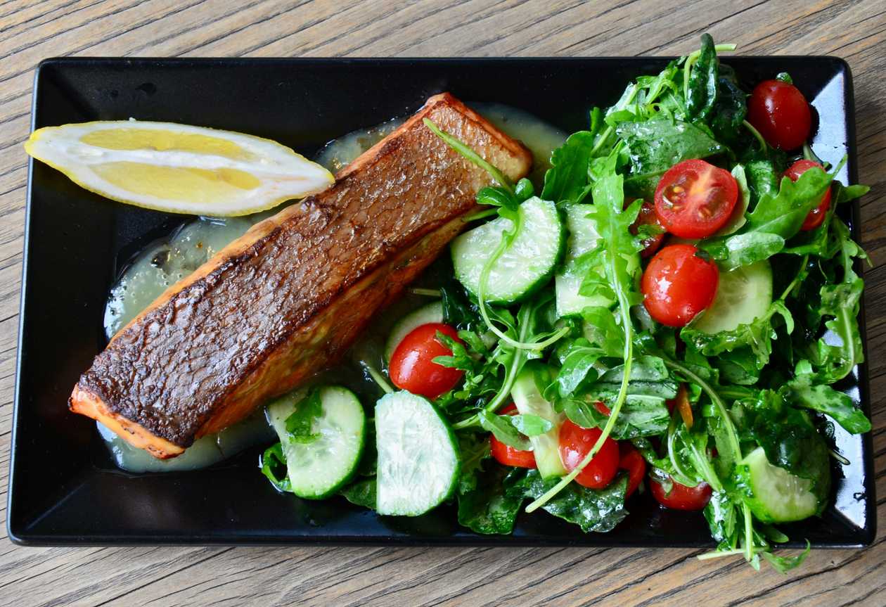 Salmon fillet in orange sauce