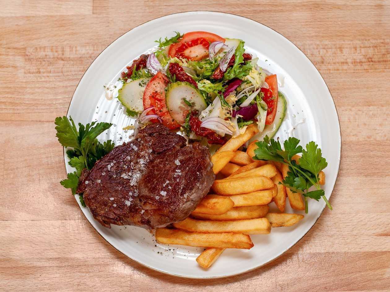 Roast pork steak with pepper sauce