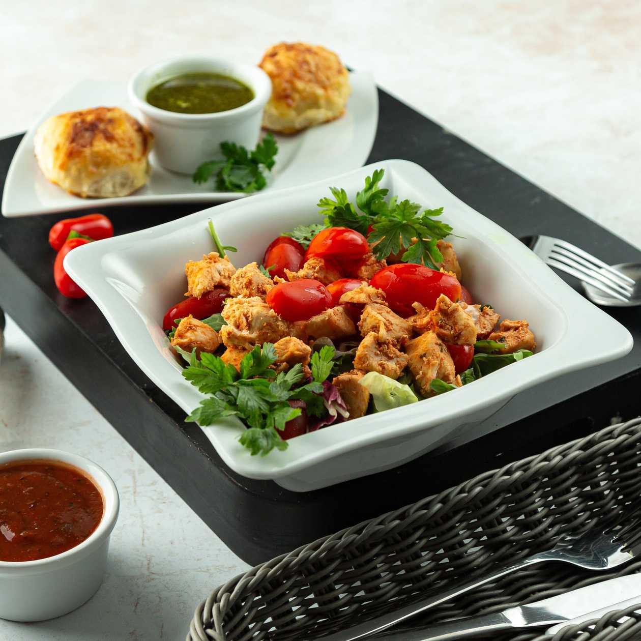 Mixed salad with dressing and grilled chicken