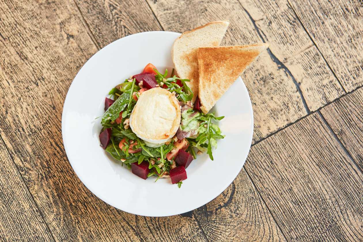 Vegetable salad with cheese, toast