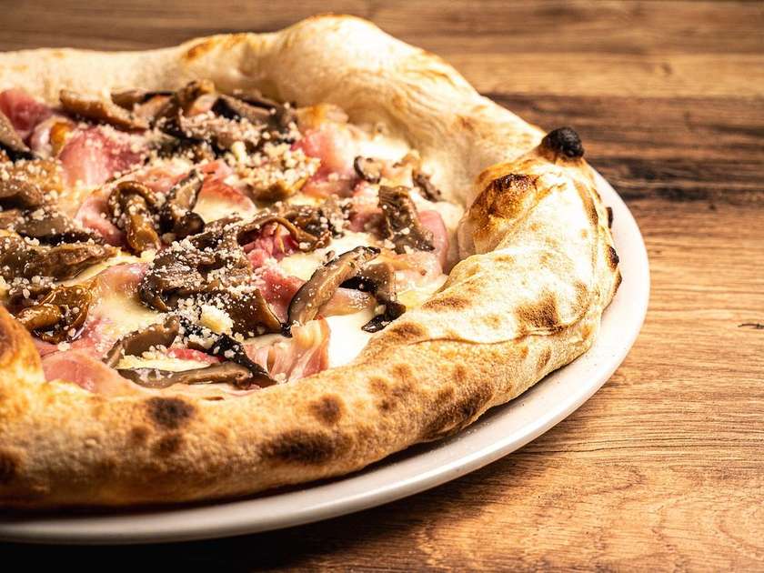 Prosciutto e funghi